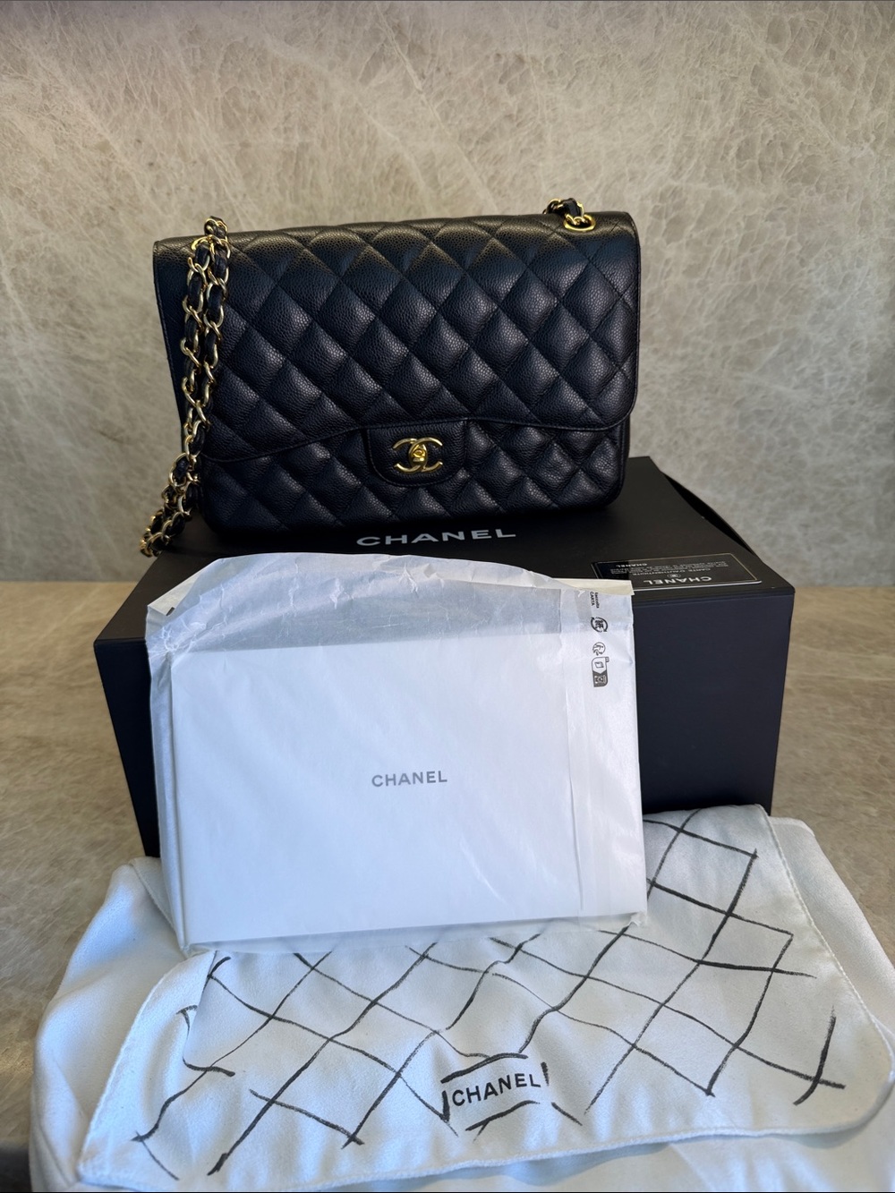 Chanel Jumbo Classic Double Flap Bag Black Caviar Gold Hardware